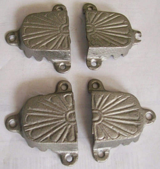 M125 - Cast Iron Trunk Handle Caps